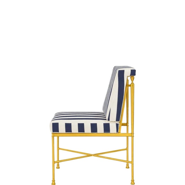 A set of 6 refined dining chairs designed by Michael Taylor Designs, defined by clean architectural lines and a...