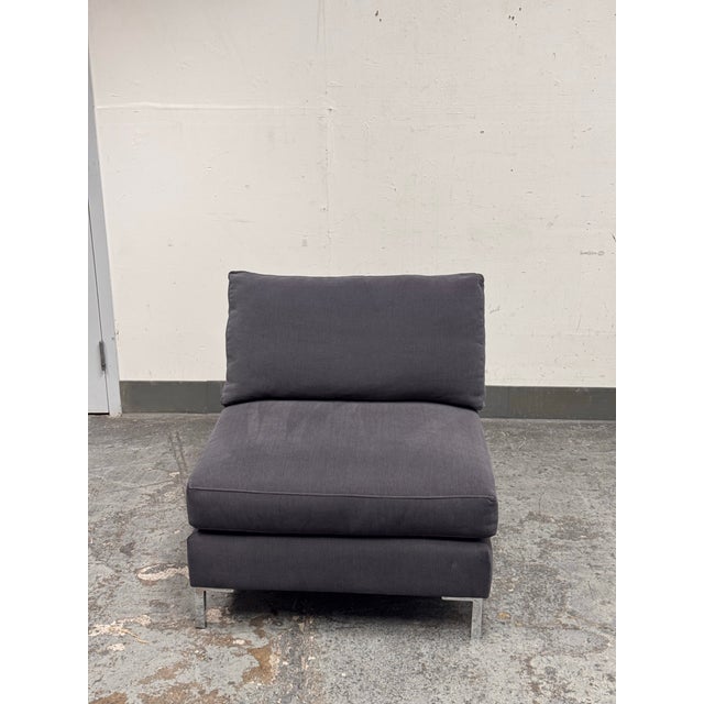 Design Plus Gallery presents the Decker Slipper Chair from CB2. This slight, modern chair has comfortable seat and back...