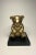 This bright eyed solid brass bear sits atop a square black and green marbler base. The piece would look great on a...