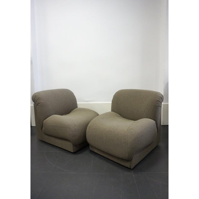 Pair of modular armchairs from the 1970s, manufactured and designed by Doimo Salotti. A very characteristic 1970s design,...