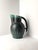 This Art Deco style ceramic pitcher, designed by Colin Melbourne for Beswick, England, is a bold example of mid-century...