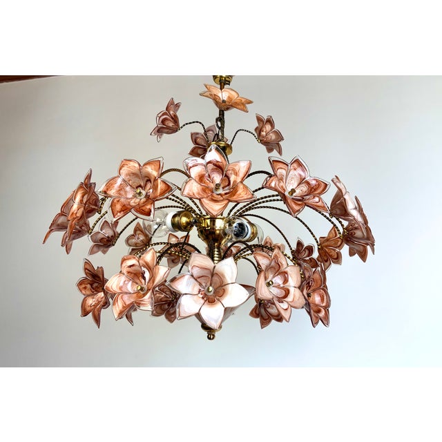 Beautiful Italian Murano style floral chandelier from the 1980s featuring hand-blown brown and white glass flowers on a...
