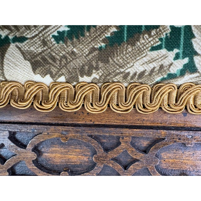 This is a classic Chippendale style pair of benches in walnut. These benches have been newly upholstered in a green, taupe...