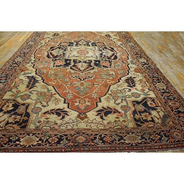 Antique Persian Serapi rug, size: 8'5" x 12'6". Antique Serapi Floral Medallion Hand Knotted Pile Rug, Circa Date: 1890s....