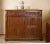 A massive Flemish oak chest of drawers from the 17th century with a richly carved front and original historical character....