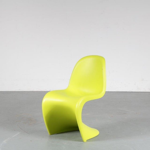 A beautiful children chair designed by Verner Panton, manufactured by Vitra in Germany around 2000. This is an iconic...