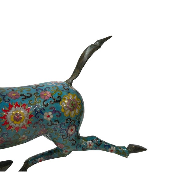 This striking sculpture is a vibrant, cloisonné enamel reimagining of the famous "Galloping Horse Treading on a Flying...