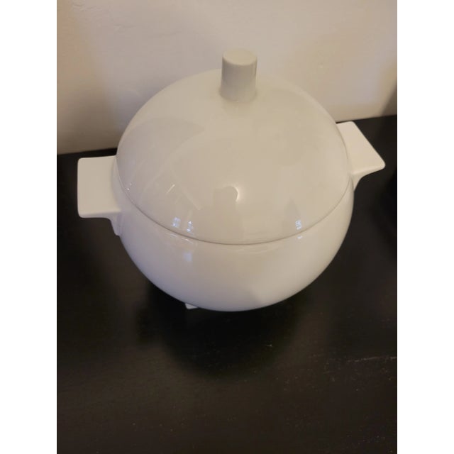 Italian artist and architect Aldo Rossi designed this geometrical dish as part of his Il Faro series for Rosenthal's...