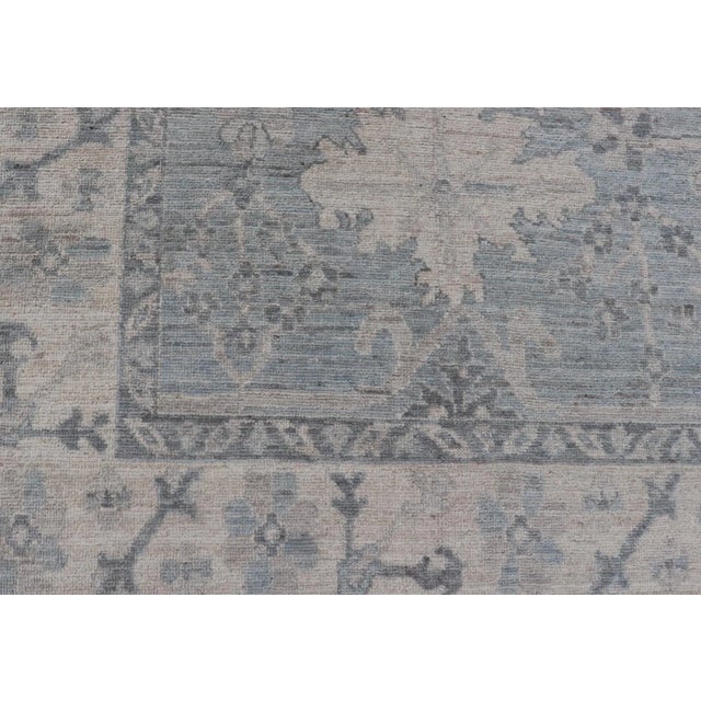 Textile 2020s Modern Oushak With Floral and Tribal Motifs With Cream, Gray and Powder Blue For Sale - Image 7 of 13