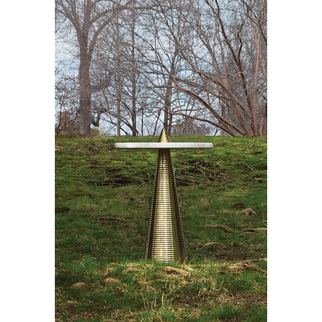 New special order item. Not vintage. The Pasha round side table with conical coiled brass and white marble top is a...