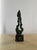 A stylish little abstract sculpture. Bronze - it has a good heavy weight. It tactile surface shows all the marks and...
