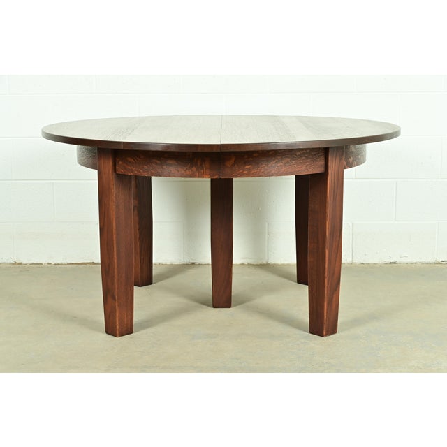 A rare and exceptional antique Mission or Arts & Crafts period quarter sawn oak extension dining table By Charles Stickley...