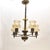 Distinctive twisted central column with 5 curved brass arms each supporting a delicate swirled glass shade. Brass...