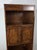 This vintage wall unit by Thomasville features hardwood construction, oak veneer with original finish, a mixture of open...