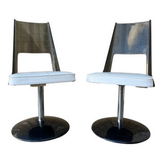 Pair of Mid Century Modern Smoked Lucite Swivel Chairs by Daystrom. Circa 1970s For Sale