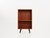 The bookcase was made in the 1970s, Danish production. The structure is covered with teak veneer. The legs have been made...