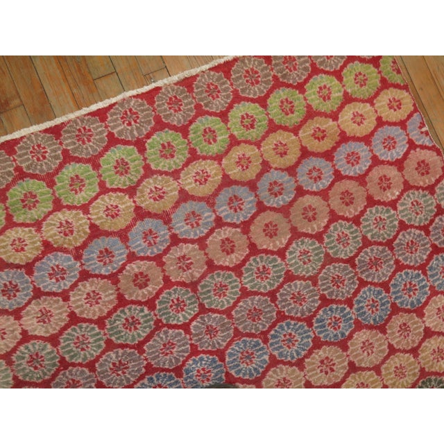 A cheerful midcentury Turkish Anatolian rug with an all-over cintomani design in fun colors. Bright Red field with accents...