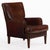 This warm brown tone chair is in very good condition and sits well with squared crest and arms and subtly canted back. It...