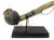 An early 20th century finely carved African ceremonial pipe of the Dinka tribe professionally mounted on an iron and wood...