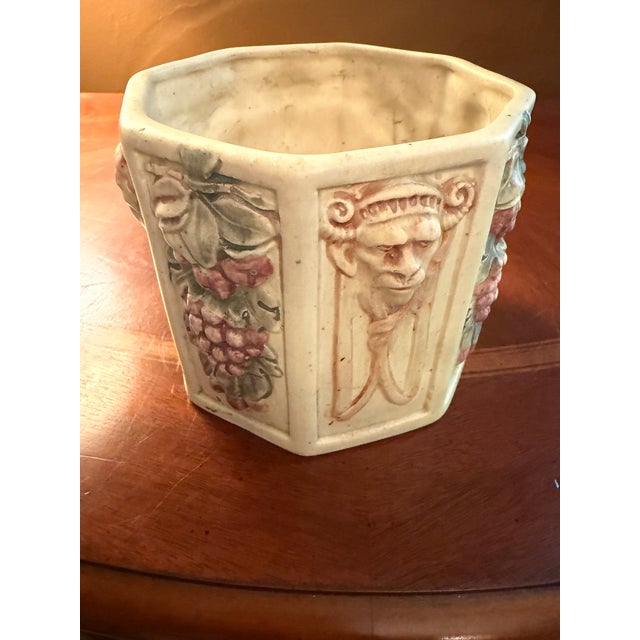 The Antique Weller "Roma" Octagonal Planter or Jardiniere from around 1910 is a charming piece of decorative pottery. With...
