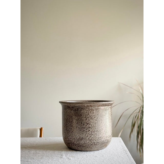 Authentic vintage Gainey Ceramics planter, produced in La Verne, California. This example departs from the more common...