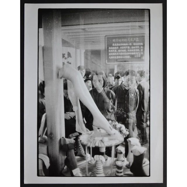 Chinese gazing at Western products, China 1950s. Keywords: China; Chinese; people; shop window; communism; Hong Kong;...