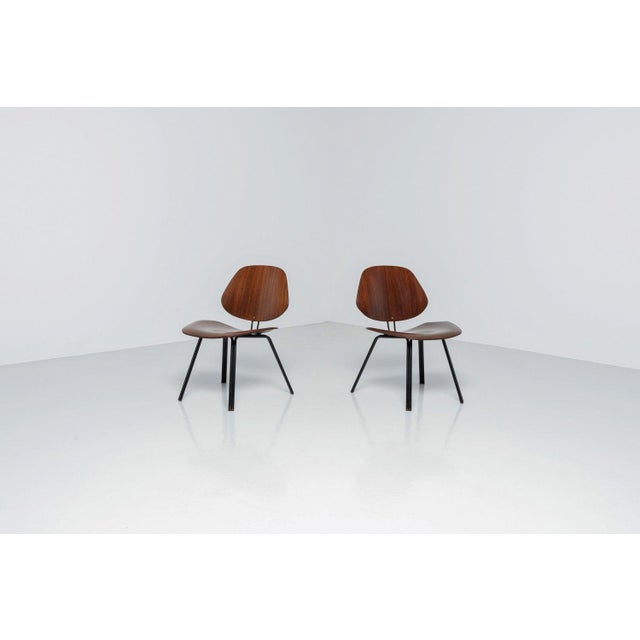 Beautiful P31 chairs by Osvaldo Borsani and made in Italy by Tecno in 1957. The chairs are in fully original condition and...