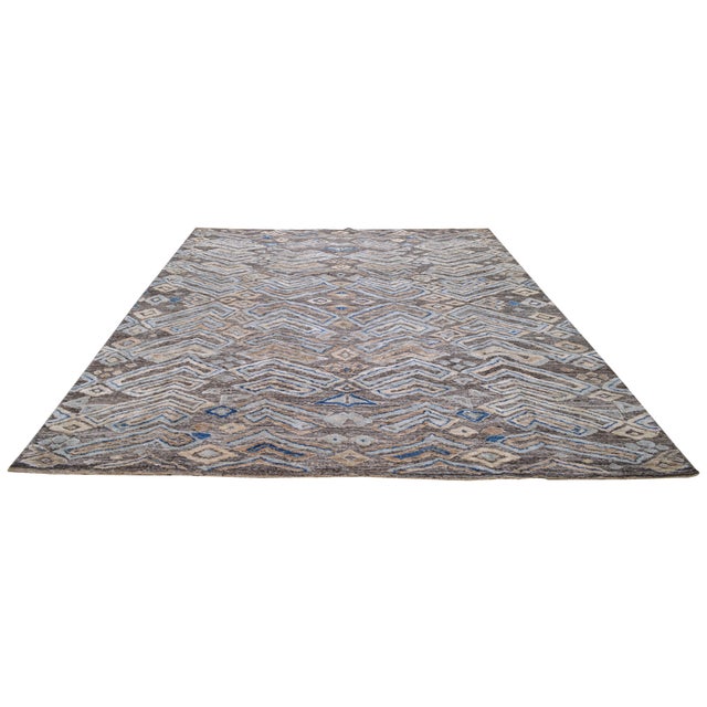 Moroccan Sheba Hand-knotted with care using traditional rug-making techniques, this wool rug blends timeless craftsmanship...