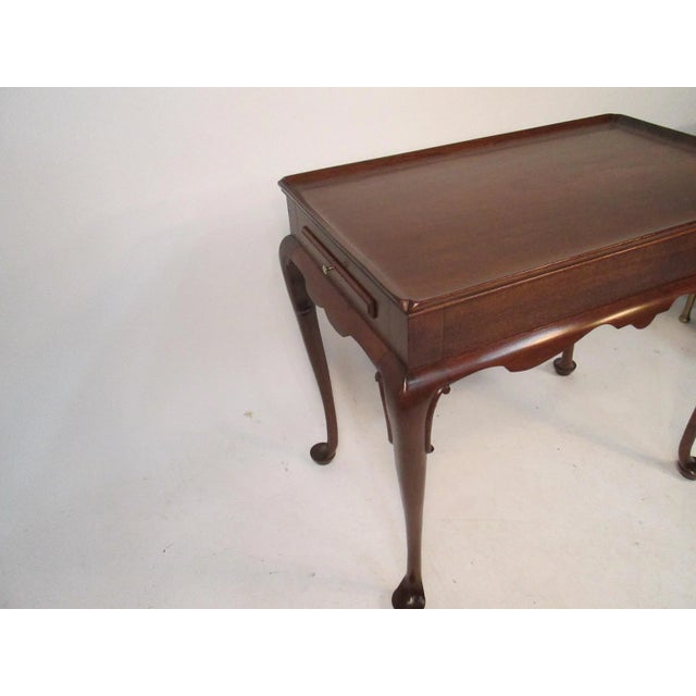 This a very nice solid mahogany tea table made by Biggs furniture of Richmond VA. This Queen Ann designed table has two...