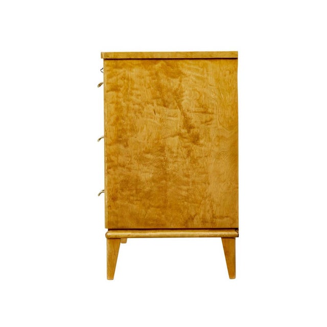 Mid century Scandinavian tiger birch chest of drawers circa 1950. Fine quality Swedish chest of drawers, which draws...