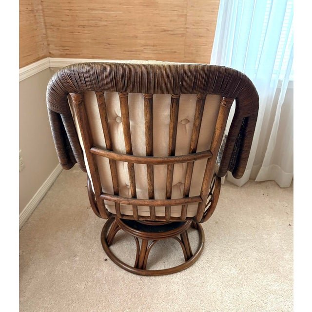 1970s Lewittes Furniture rattan/wicker swivel chair w/ cream tufted original cushions. Excellent condition.