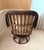 1970s Lewittes Furniture rattan/wicker swivel chair w/ cream tufted original cushions. Excellent condition.