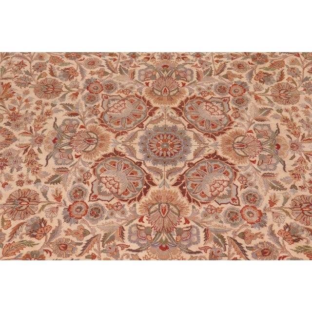 Designed with mesmerizing intricacy and gorgeous color palette, this hand-knotted masterpiece demonstrates the beauty and...