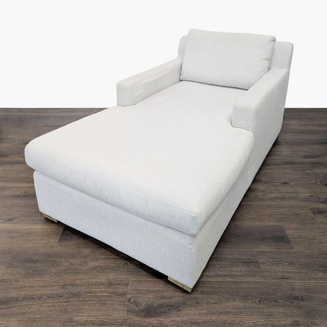 Features track arms and fabric upholstery with wood block feet. Brand: Restoration Hardware. Model: Maxwell. Original...