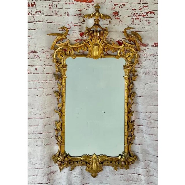 19th Century Giltwood Wall Mirror with Hoho Birds. Mirror is a striking example of the English taste for chinoiserie...