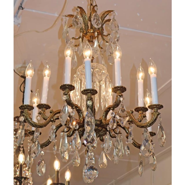 Hollywood Regency 1950's Hollywood Regency French Style Brass & Crystal 12 Light Chandelier For Sale - Image 3 of 14