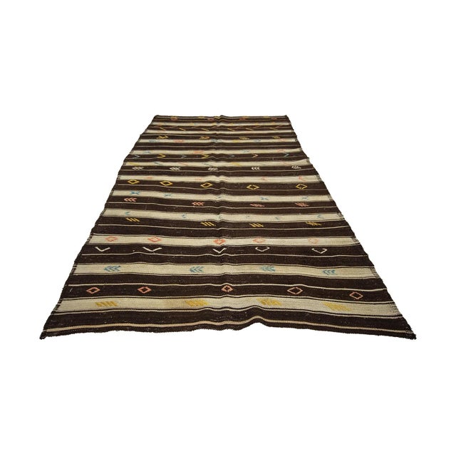 Vintage handwoven decorative kilim rug from Afyon region of Turkey. Approximately 50-60 years old. In very good condition.