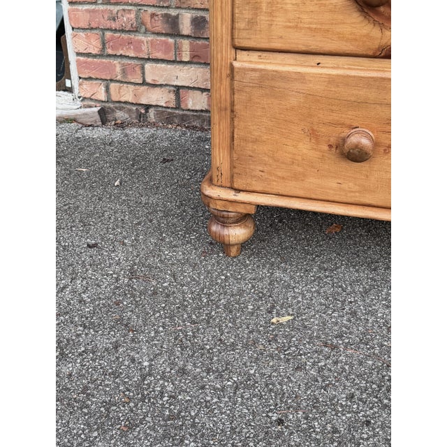 This is a lovely antique pine chest! This piece dates to the 19th century and has lovely patina. The wood has a warm glow,...
