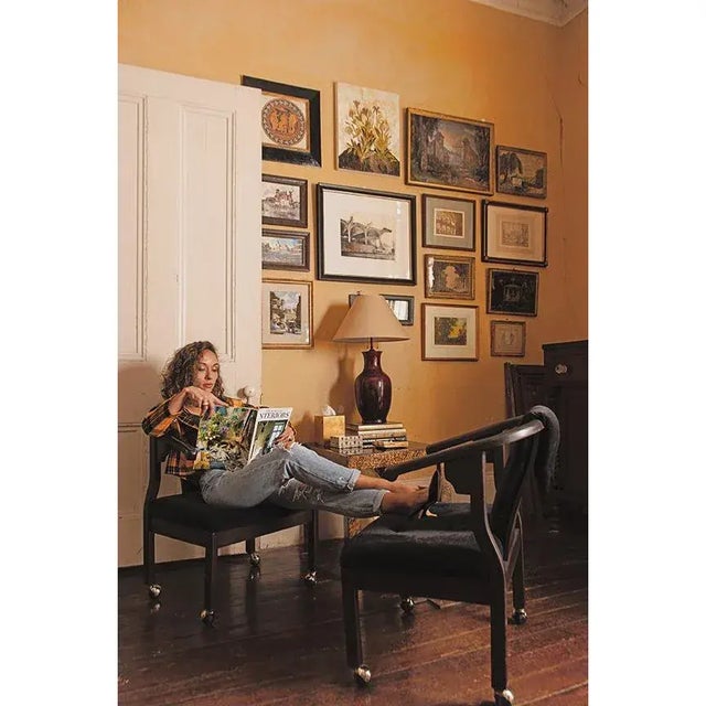 Pair of 1975 Bernhardt horseshoe chairs featuring deep brown curved wood frames and black velvet upholstery. Chrome...