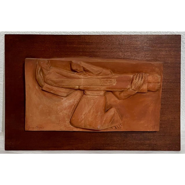 Two Figures (Mother and son) 9" x 17" terracotta sculpture, signed lower left mounted to wood panel, 15 1/2" x 23 1/2"...