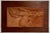 Two Figures (Mother and son) 9" x 17" terracotta sculpture, signed lower left mounted to wood panel, 15 1/2" x 23 1/2"...