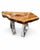 A striking contemporary live edge table featuring a richly figured natural wood slab supported by sculptural polished...