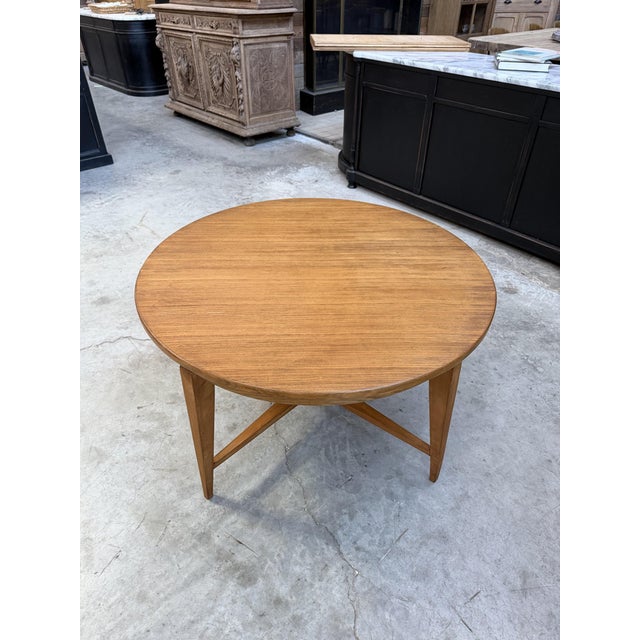 This clever table from the 1950s/1960s, designed by Marcel Gascoin, has been fully restored while retaining a slight...
