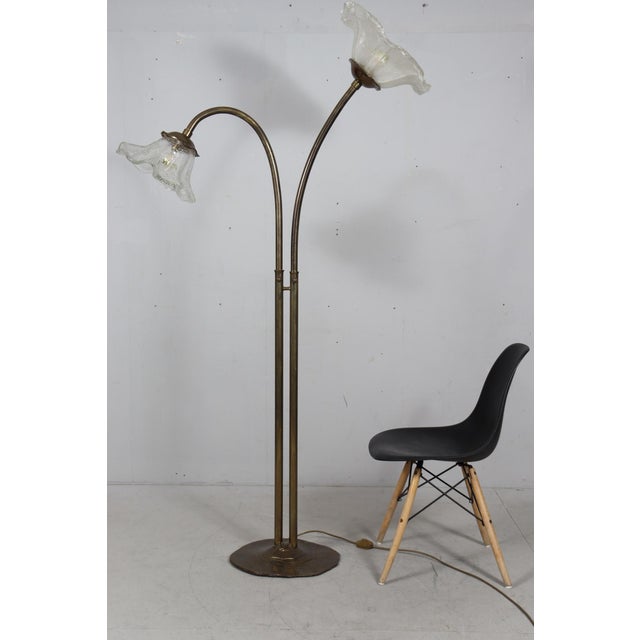 Brutalist floor lamp/floor lamp, germany, 1980s, massive, swiveling construction made of bronze with flower-shaped shades...