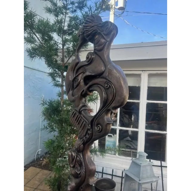 This impressive sculpture stands at a height of 89 inches and features a striking bronze finish. Crafted in 1996, this...