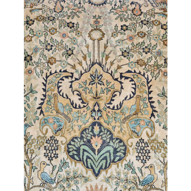 Hand-knotted rug from the Tabriz region with the motif of the Tree of Life, a symbol of prosperity, continuity and...