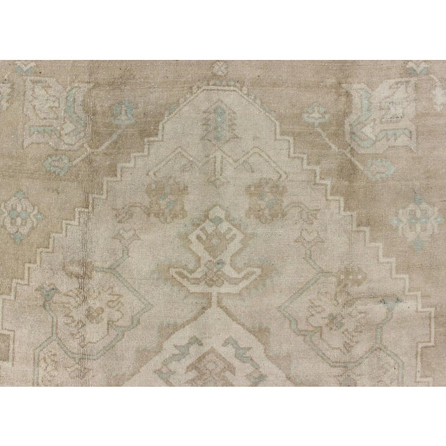 Mid 20th Century Mid 20th Century Turkish Vintage Oushak Medallion Rug With Muted Colors in Earth Tones For Sale - Image 9 of 11