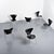 Set of model 3107 "Series 7" chairs designed by Arne Jacobsen in 1955. Made of molded, black lacquered plywood resting on...