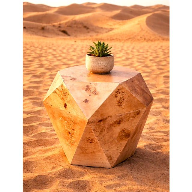 The Argento Side Table is a great addition to any interior concept. Produced from Burlwood, it is a very durable side...