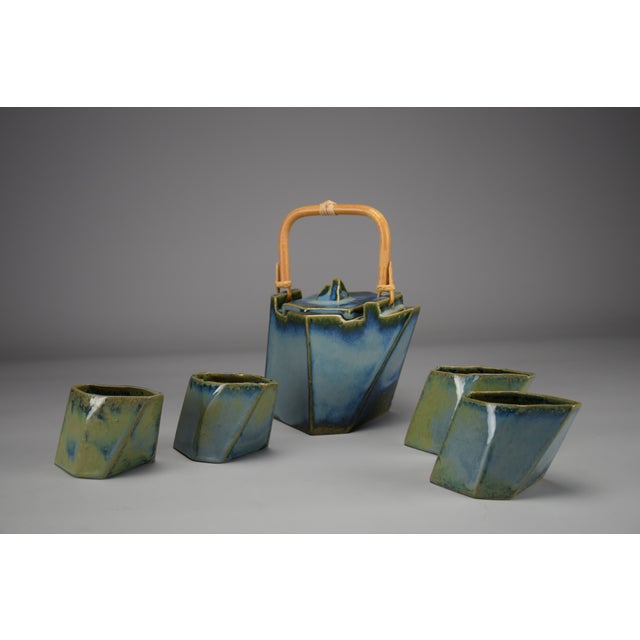 Introducing a One-of-a-Kind Masterpiece: The "CHRL" Ceramic Tea Set Step into a world of unparalleled artistry with this...